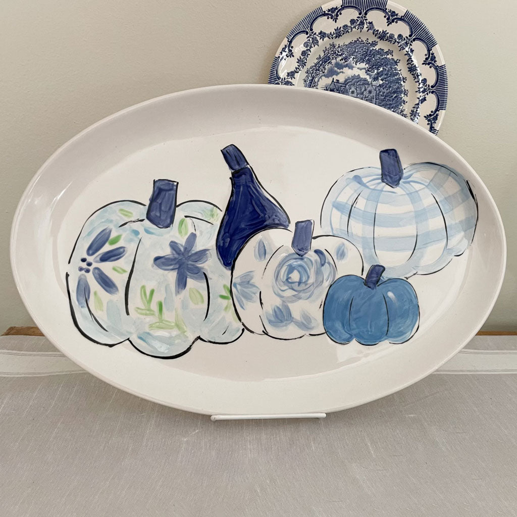 Oval platter painted with blue and white pumpkins